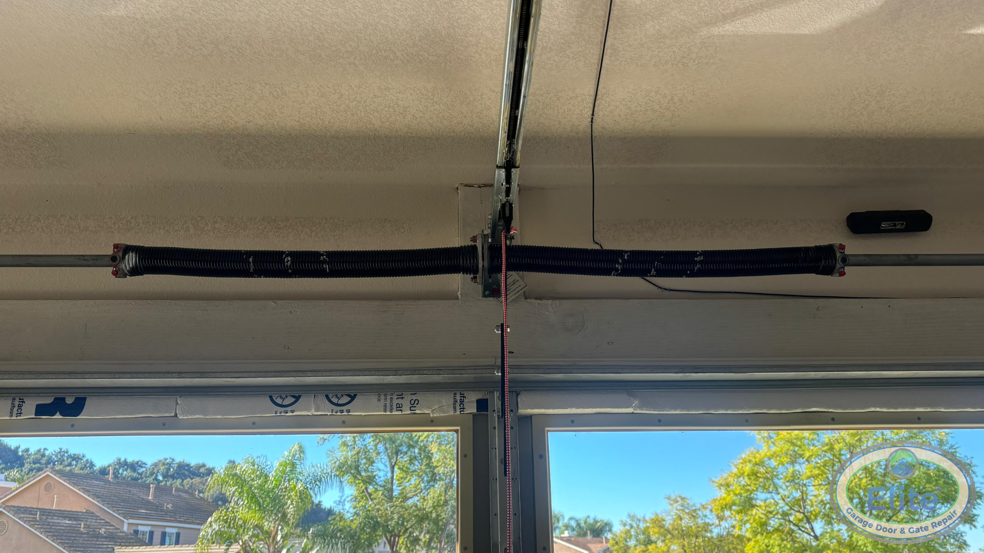 Safety Differences You Should Know - Extension vs. Torsion Springs: What's the Difference?